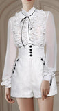 Ruffled White Blouse with High Waist Shorts